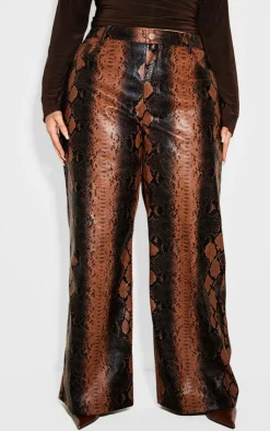 PrettyLittleThing Christmas Shop*Plus Faux Leather Snake Print Wide Leg Pants