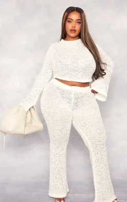 PrettyLittleThing Plus Bobble Glitter Knit Flared Pants Cream