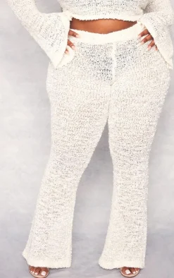 PrettyLittleThing Plus Bobble Glitter Knit Flared Pants Cream
