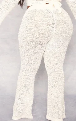 PrettyLittleThing Plus Bobble Glitter Knit Flared Pants Cream