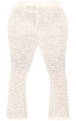 PrettyLittleThing Plus Bobble Glitter Knit Flared Pants Cream