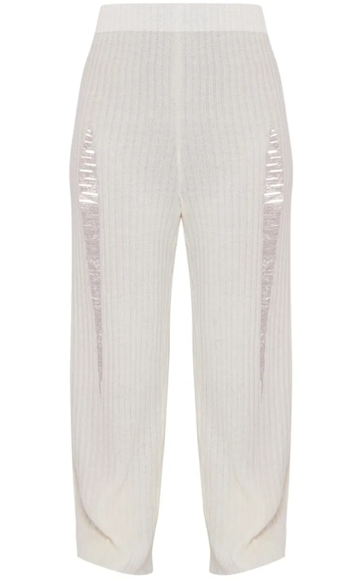 Plus Cream Distressed Knitted Leggings