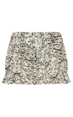 Online PrettyLittleThing Plus Leopard Lace Up Ruffle Hem Skirt Cream