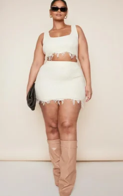 Hot PrettyLittleThing Plus Raw Hem Knit Crop Top Cream