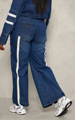 Hot PrettyLittleThing Plus Graphic Detail Panelled Wide Leg Jeans Mid Blue Wash