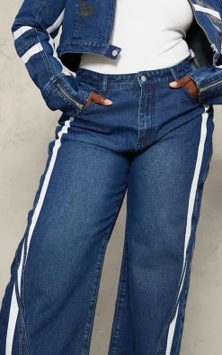 Hot PrettyLittleThing Plus Graphic Detail Panelled Wide Leg Jeans Mid Blue Wash