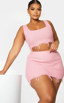 PrettyLittleThing Plus Raw Hem Knit Crop Top Pink