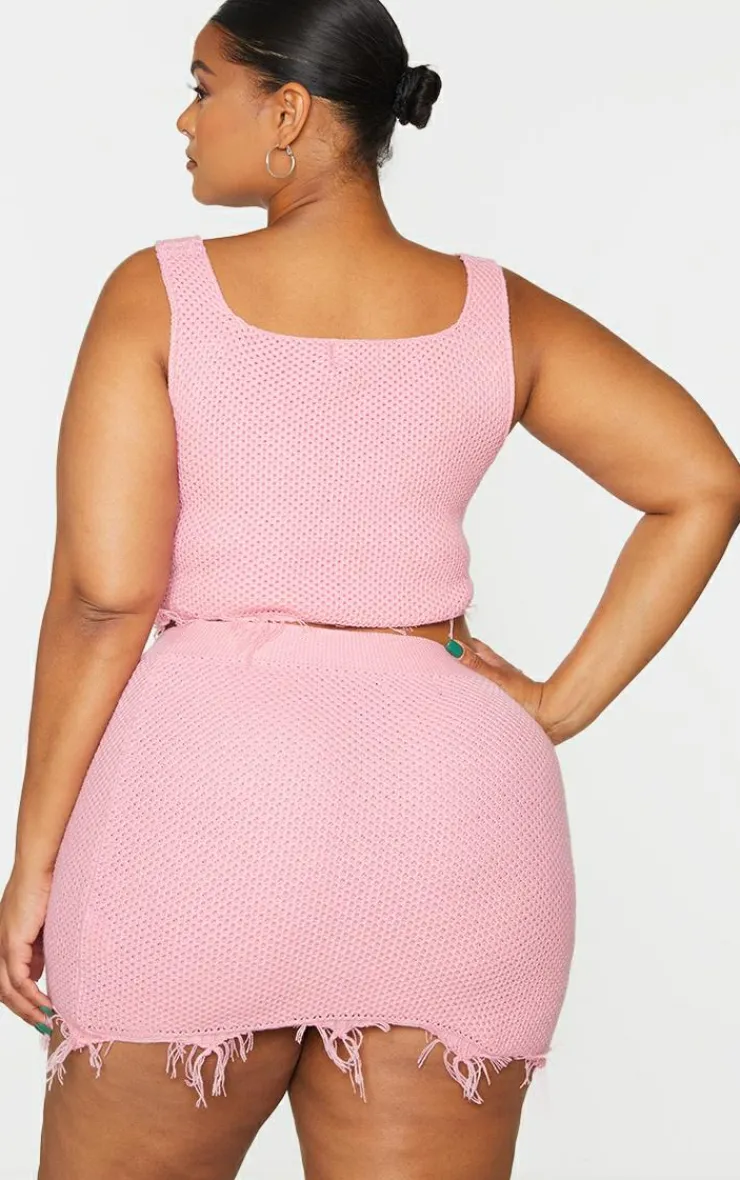 PrettyLittleThing Plus Raw Hem Knit Crop Top Pink