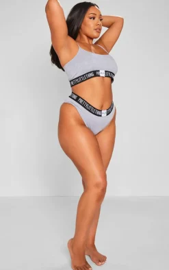 PrettyLittleThing Christmas Shop*Plus PRETTYLITTLETTHING Jersey Logo Tape Lingerie Set