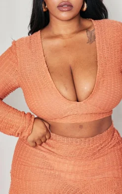 PrettyLittleThing Plus Textured Frayed Detail V Neck Long Sleeve Top Rust