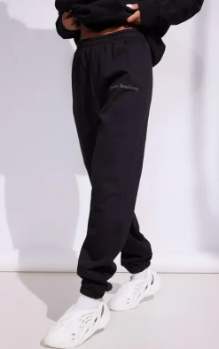 PrettyLittleThing Black Sweatsuits*Premium Coal Sports Academy Puff Print Oversized Sweatpants