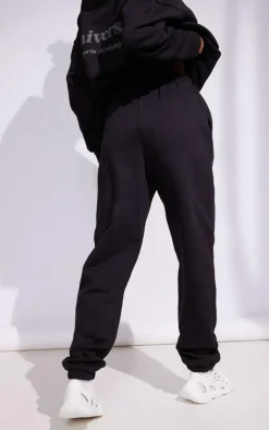 PrettyLittleThing Black Sweatsuits*Premium Coal Sports Academy Puff Print Oversized Sweatpants