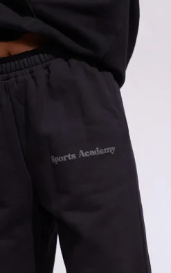 PrettyLittleThing Black Sweatsuits*Premium Coal Sports Academy Puff Print Oversized Sweatpants