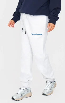 PrettyLittleThing Grey Sweatsuits*Premium Heather Sports Academy Puff Print Oversized Sweatpants