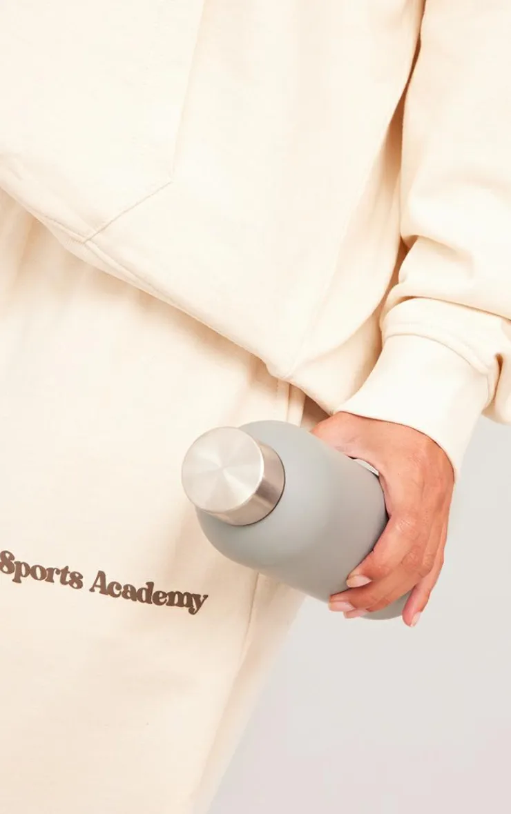 PrettyLittleThing Cream Sweatsuits*Premium Petite Sports Academy Puff Print Oversized Sweatpants