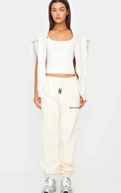 PrettyLittleThing Premium Sports Academy Puff Print Oversized Sweatpants Sand