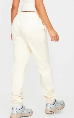 PrettyLittleThing Premium Sports Academy Puff Print Oversized Sweatpants Sand