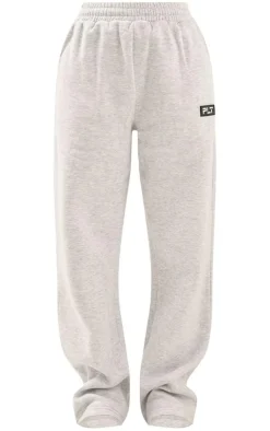 PrettyLittleThing Grey Sweatsuits*Logo Badge Detail Straight Leg Sweatpant