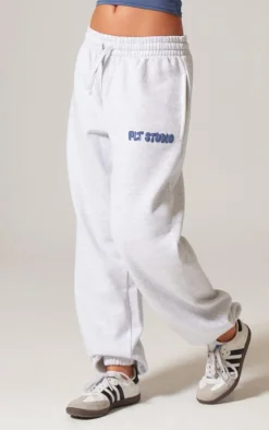 PrettyLittleThing Christmas Shop*Ash Grey Premium Studio Print Cuffed Sweatpants