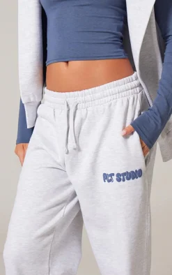PrettyLittleThing Christmas Shop*Ash Grey Premium Studio Print Cuffed Sweatpants