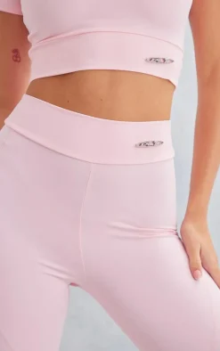 PrettyLittleThing Gym Leggings*Sport Metal Badge Sculpt High Waist Flare Pants
