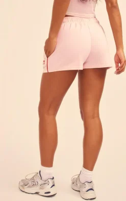 PrettyLittleThing Contrast Binding Runner Shorts Baby Pink