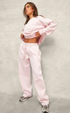 PrettyLittleThing Embossed Graphic Straight Leg Sweatpant Baby Pink