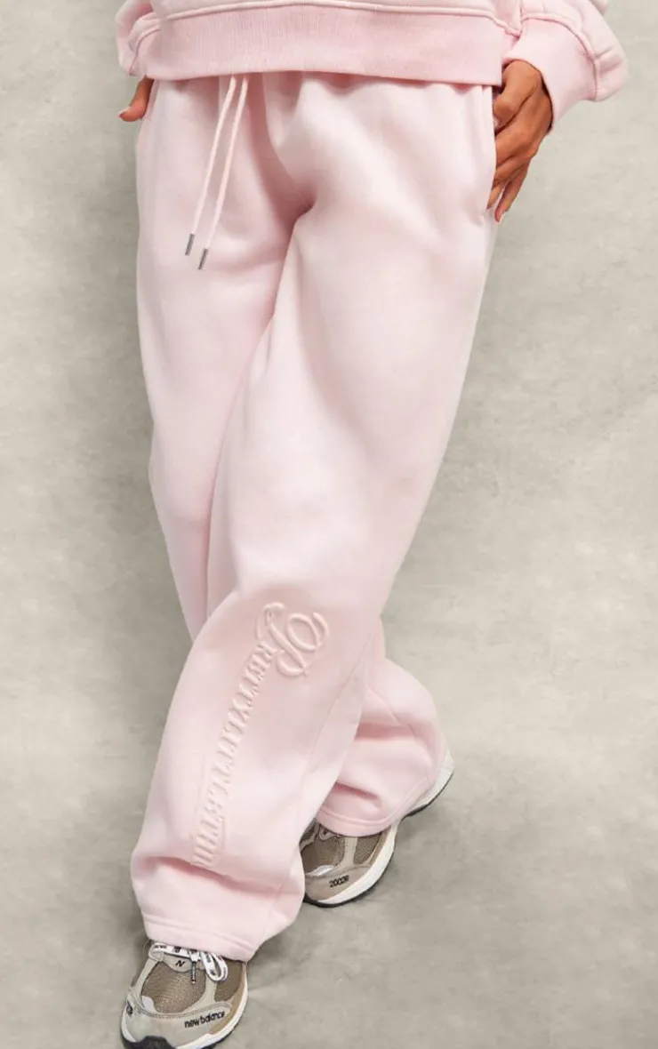 PrettyLittleThing Embossed Graphic Straight Leg Sweatpant Baby Pink