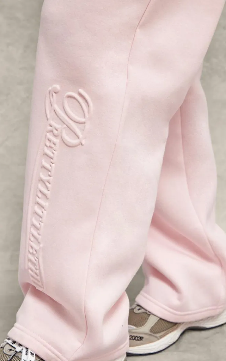 PrettyLittleThing Embossed Graphic Straight Leg Sweatpant Baby Pink