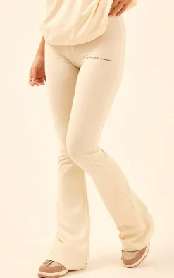 Sale PrettyLittleThing Printed Flared Pants Beige
