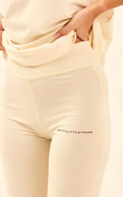 Sale PrettyLittleThing Printed Flared Pants Beige