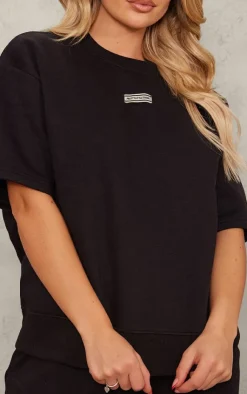 Discount PrettyLittleThing Badge Detail Oversized Short Sleeve Sweatshirt Black