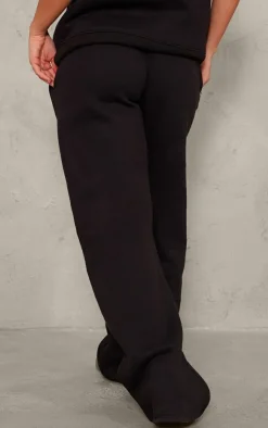 Online PrettyLittleThing Badge Detail Mid Rise Wide Leg Sweatpants Black