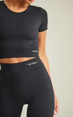 PrettyLittleThing Workout Tops*Sport Metal Badge Sculpt Short Sleeve Crop Top