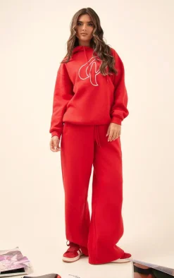 Online PrettyLittleThing Logo Embroidered Oversized Hoodie Cherry Red