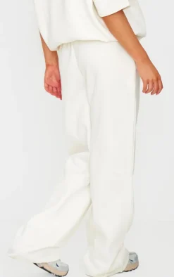 Sale PrettyLittleThing Badge Detail Mid Rise Wide Leg Sweatpants Cream