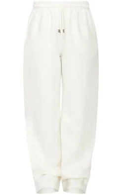 Sale PrettyLittleThing Badge Detail Mid Rise Wide Leg Sweatpants Cream