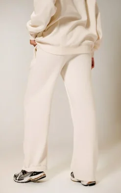 Online PrettyLittleThing Contrast Logo Badge Wide Leg Sweatpants Cream