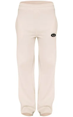 Online PrettyLittleThing Contrast Logo Badge Wide Leg Sweatpants Cream