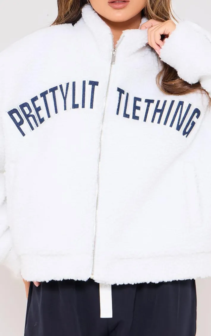 PRETTYLITTLETHING Cream Graphic Zip Up Fleece Jacket