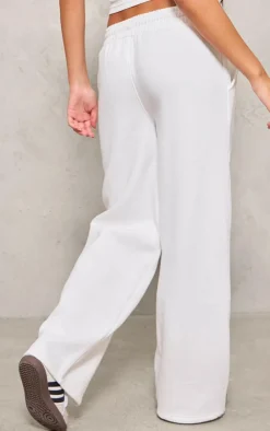 Discount PrettyLittleThing Oversized Low Rise Wide Leg Sweatpants Cream