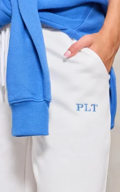 Discount PrettyLittleThing Oversized Low Rise Wide Leg Sweatpants Cream