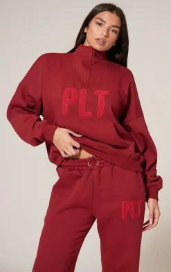 Clearance PrettyLittleThing Borg Applique Quarter Zip Sweatshirt Dark Red