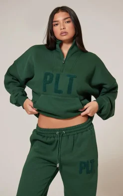 Sale PrettyLittleThing Borg Applique Quarter Zip Sweatshirt Forest Green