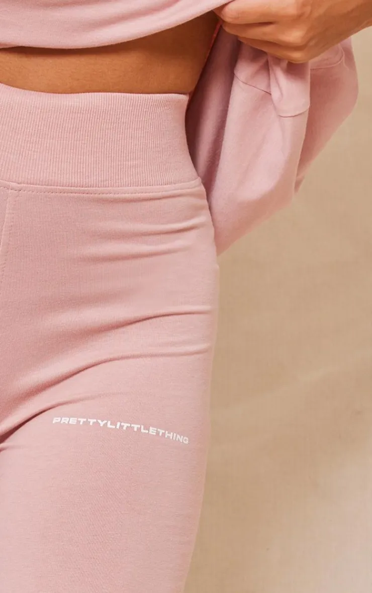 Clearance PrettyLittleThing Printed Flared Pants Light Pink