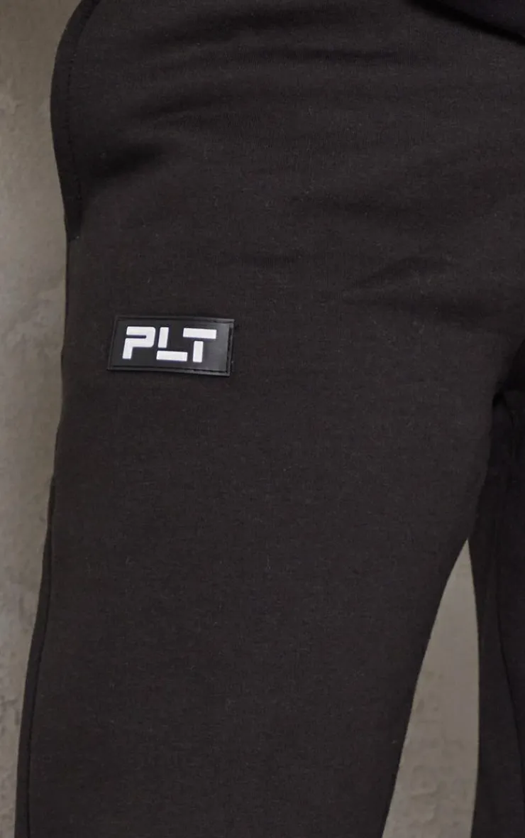 PrettyLittleThing Black Sweatsuits*Logo Badge Detail Straight Sweatpants