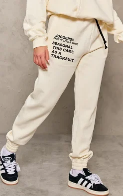 PrettyLittleThing Cream Sweatsuits*Logo Graphic Print Sweatpants