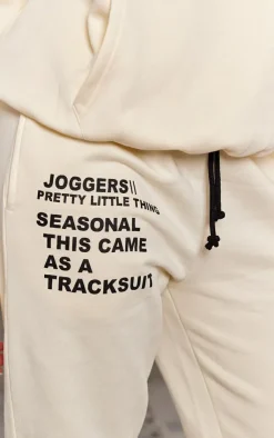PrettyLittleThing Cream Sweatsuits*Logo Graphic Print Sweatpants