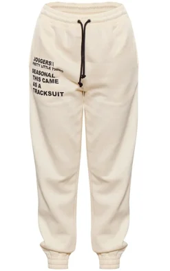PrettyLittleThing Cream Sweatsuits*Logo Graphic Print Sweatpants