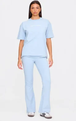 Discount PrettyLittleThing Printed Flared Pants Pale Blue